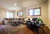 Downstairs living area with queen sleeper sofa.