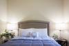 Downstairs bedroom with queen bed