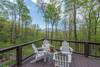 Side deck with gas grill and seating for 8 throughout the deck