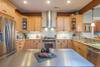 Kitchen island offers additional meal prep space.