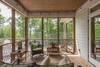 Screened in porch is the perfect escape for rainy afternoons.
