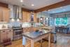 Open, modern and fully equipped kitchen.