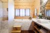 Master bathroom with soaking tub and walk-in shower.