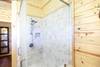 Master bathroom walk-in shower (also with soaking tub).