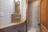 Downstairs bathroom with walk-in shower.