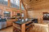 Large windows overlooking the mountains above the kitchen