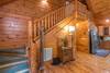 Stairs to upper level king bedroom.