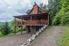 Side view, parking area and upper deck entry access to the cabin