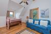Upper level bedroom with full bed and sleeper sofa