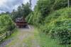 Driveway view of Cabin Unwined