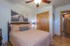 Lower level bedroom with full bed