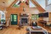 Main floor living area with beautiful cathedral ceilings.