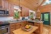 Kitchen open to dining area and living area.