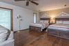 Master bedroom on main level w/ 2 queens 7 en suite bathroom.
