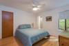 Bedroom on main level with queen bed & full bath.