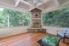 Apt screen porch w/ wood fireplace.
