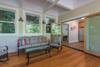 Screen porch in apartment- leading to kitchen.