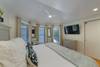 KING W/LARGE MOUNTED FLAT SCREEN TV KING W/LARGE MOUNTED FLAT SCREEN TV
