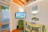 DINING AREA FOR TWO AND FLAT SCREEN PLASMA TV DINING AREA FOR TWO AND FLAT SCREEN PLASMA TV