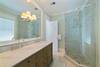 PRIMARY BATHROOM W/DUAL MARBLE VANITIES & GLASS ENCLOSED WALK IN PRIMARY BATHROOM W/DUAL MARBLE VANITIES & GLASS ENCLOSED WALK IN