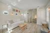 LIVING AREA AND SPIRAL STAIRCASE LEADS TO BEDROOM UP LIVING AREA AND SPIRAL STAIRCASE LEADS TO BEDROOM UP