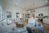 LIVING AREA NEXT TO FULLY EQUIPPED, COASTAL KITCHEN