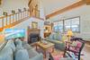 OPEN LIVING WITH DUAL SOFAS, ROCKERS AND FLATSCREEN TV OPEN LIVING WITH DUAL SOFAS, ROCKERS AND FLATSCREEN TV
