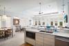 GENEROUS COMBINED LIVING AND DINING WITH HIGH CEILINGS GENEROUS COMBINED LIVING AND DINING WITH HIGH CEILINGS