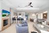 OPEN, AIRY LIVING WITH SEATING AND MOUNTED FLATSCREEN TV OPEN, AIRY LIVING WITH SEATING AND MOUNTED FLATSCREEN TV