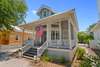 LARGE OPEN AIR PORCH W/OUTDOOR DINING & ADIRONDACK SEATING FOR T