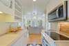 KITCHEN W/FULL SINK & CUSTOM BUILT IN SHELVES & CABINETS