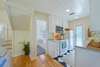 VIEW FROM KITCHEN TO QUEEN BEDROOM DOWN