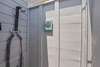 ENCLOSED OUTDOOR SHOWER ON SIDE OF COTTAGE
