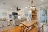 DINING FEATURING LARGE, WOODEN TABLE DINING FEATURING LARGE, WOODEN TABLE