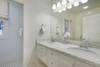 RENOVATED MARBLE MASTER BATH WITH DUAL VANITIES RENOVATED MARBLE MASTER BATH WITH DUAL VANITIES