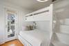 THIRD BEDROOM CUSTOM BUILT IN BUNK ROOM W/PORCH ACCESS THIRD BEDROOM CUSTOM BUILT IN BUNK ROOM W/PORCH ACCESS