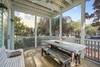 SCREENED IN FRONT PORCH W/OUTDOOR DINING SCREENED IN FRONT PORCH W/OUTDOOR DINING