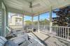 OPEN AIR PORCH W/ADIRONDACK SEATING FOR THREE OPEN AIR PORCH W/ADIRONDACK SEATING FOR THREE