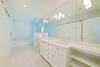 EXPANSIVE BATHROOM SUITE; DUAL VANITIES, SOAKER TUB & SHOWER EXPANSIVE BATHROOM SUITE; DUAL VANITIES, SOAKER TUB & SHOWER