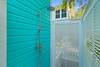 ENCLOSED OUTDOOR SHOWER ON SIDE OF COTTAGE ENCLOSED OUTDOOR SHOWER ON SIDE OF COTTAGE