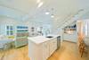 KITCHEN VIEW FACING ENTRY, STAIRCASE, AND LIVING KITCHEN VIEW FACING ENTRY, STAIRCASE, AND LIVING