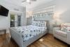 THIRD BEDROOM DOWNSTAIRS, QUEEN WITH PRIVATE PORCH ACCESS THIRD BEDROOM DOWNSTAIRS, QUEEN WITH PRIVATE PORCH ACCESS