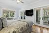 FIRST BEDROOM DOWN, KING WITH ACCESS TO SCREENED IN PORCH FIRST BEDROOM DOWN, KING WITH ACCESS TO SCREENED IN PORCH