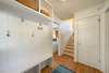 FOYER ENTRANCE W/BUILT IN STORAGE FOR BEACH GEAR