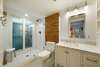 TWIN ROOM ENSUITE BATH, SINGLE VANITY & GLASS ENCLOSED SHOWER