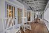 LARGE FRONT PORCH WITH SEATING AND DINING LARGE FRONT PORCH WITH SEATING AND DINING