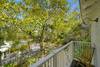 BALCONY OFF OF UPSTAIRS LIVING AREA WITH SEATING FOR TWO BALCONY OFF OF UPSTAIRS LIVING AREA WITH SEATING FOR TWO