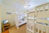 THIRD BEDROOM DOWN; BUNK ROOM ON FIRST STORY, SLEEPS 4 THIRD BEDROOM DOWN; BUNK ROOM ON FIRST STORY, SLEEPS 4
