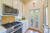 KITCHEN WITH ACCESS TO SIDE PORCH KITCHEN WITH ACCESS TO SIDE PORCH
