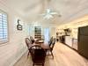 DINING/KITCHEN ALTERNATE VIEW TO REAR SCREENED PORCH DINING/KITCHEN ALTERNATE VIEW TO REAR SCREENED PORCH